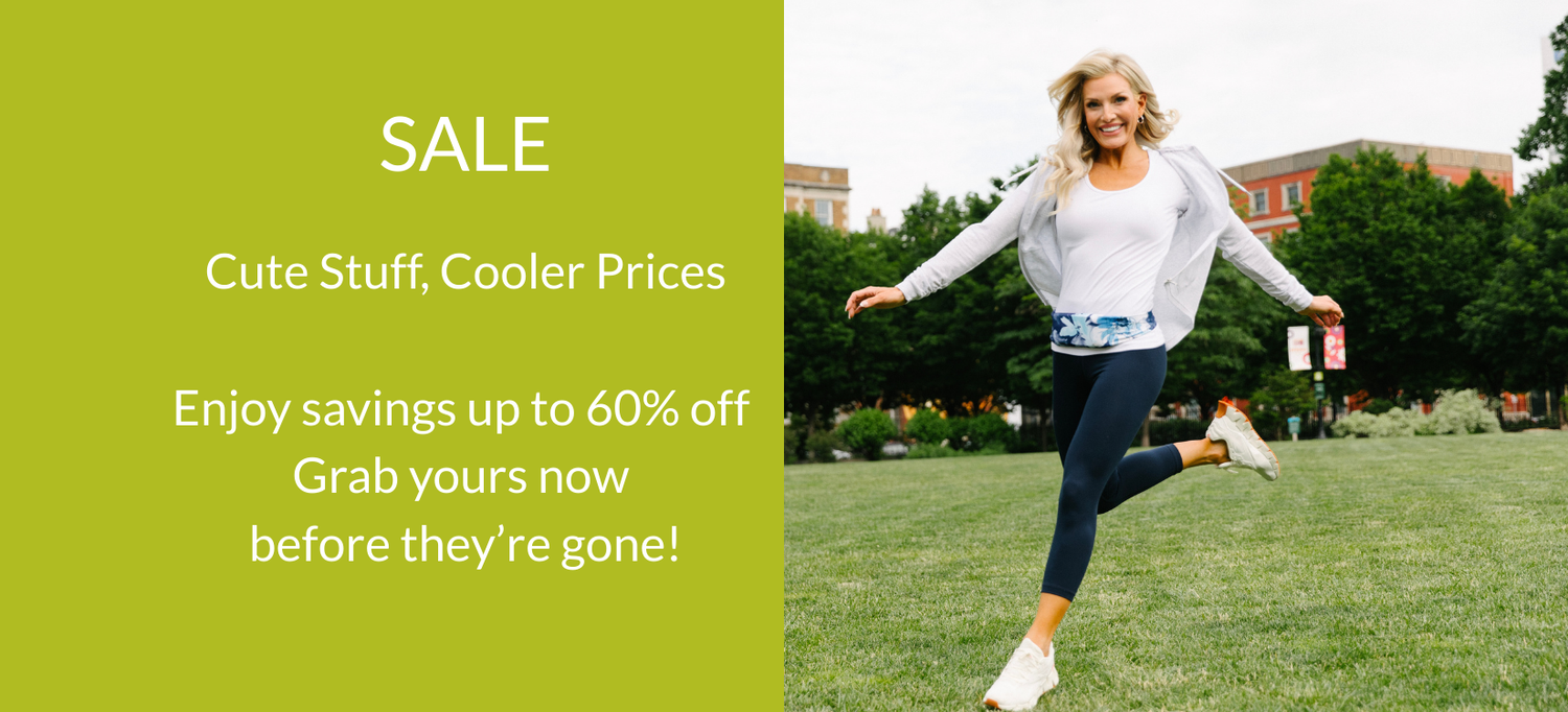 Delighted woman skipping in grass wearing a blue and white BANDI Belt with text highlighting the SALE page