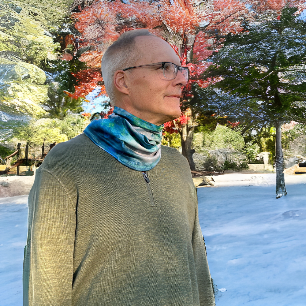 Man wearing Astrid Cozy Wrap around his neck.