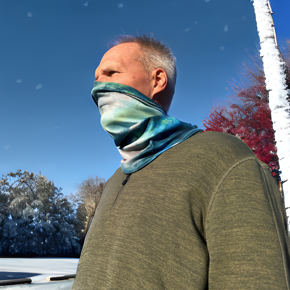 Man wearing Astrid Cozy Wrap around neck and pulled up over nose and mouth.