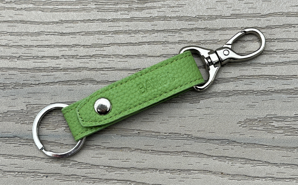 BANDI faux leather key strap with ring and removable clip.