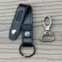 Black BANDI Keychain shown with removable clip