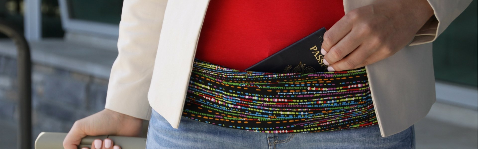 close up of pocketed belt and passport