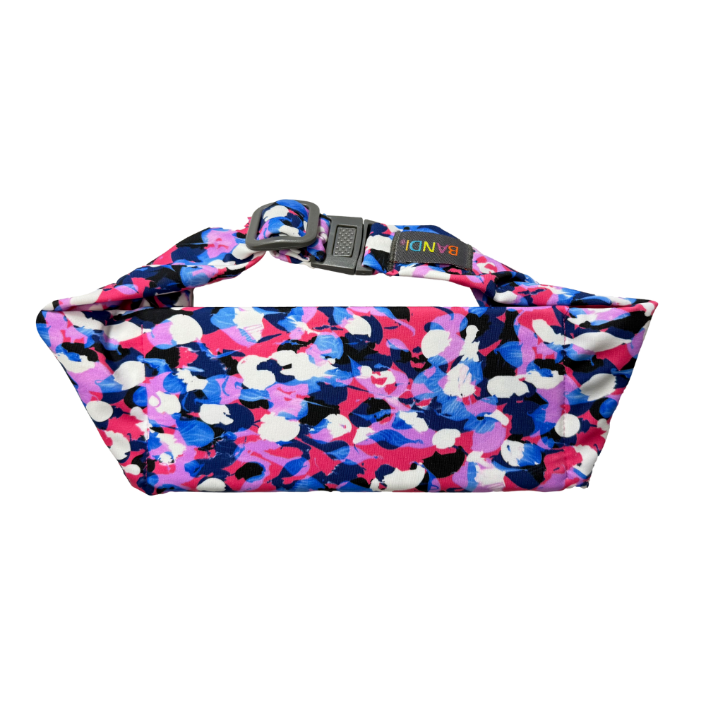Colorful patterned pink blue and white BANDI Pocket Beltwith a visible brand logo on a white background