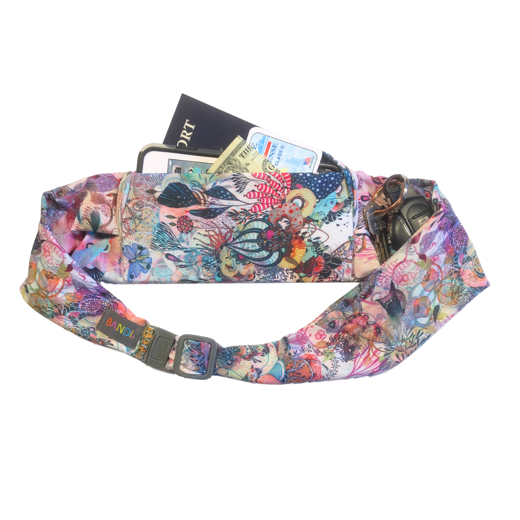 Pocket view of BANDI Wear Belt in Coral Reef print. Shades of pink with sea garden images in blues and pinks and many colors.