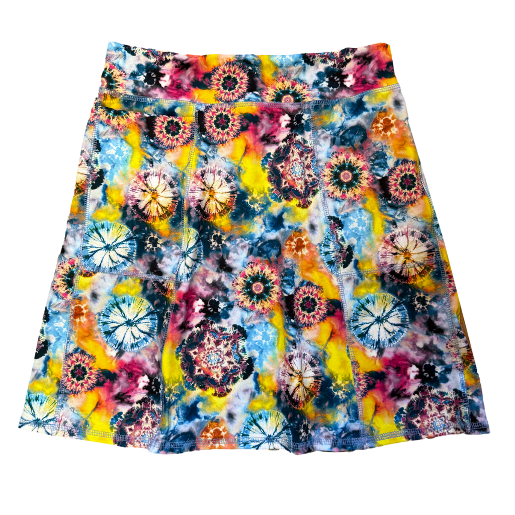 Colorful tie-dye patterned skirt on a white background