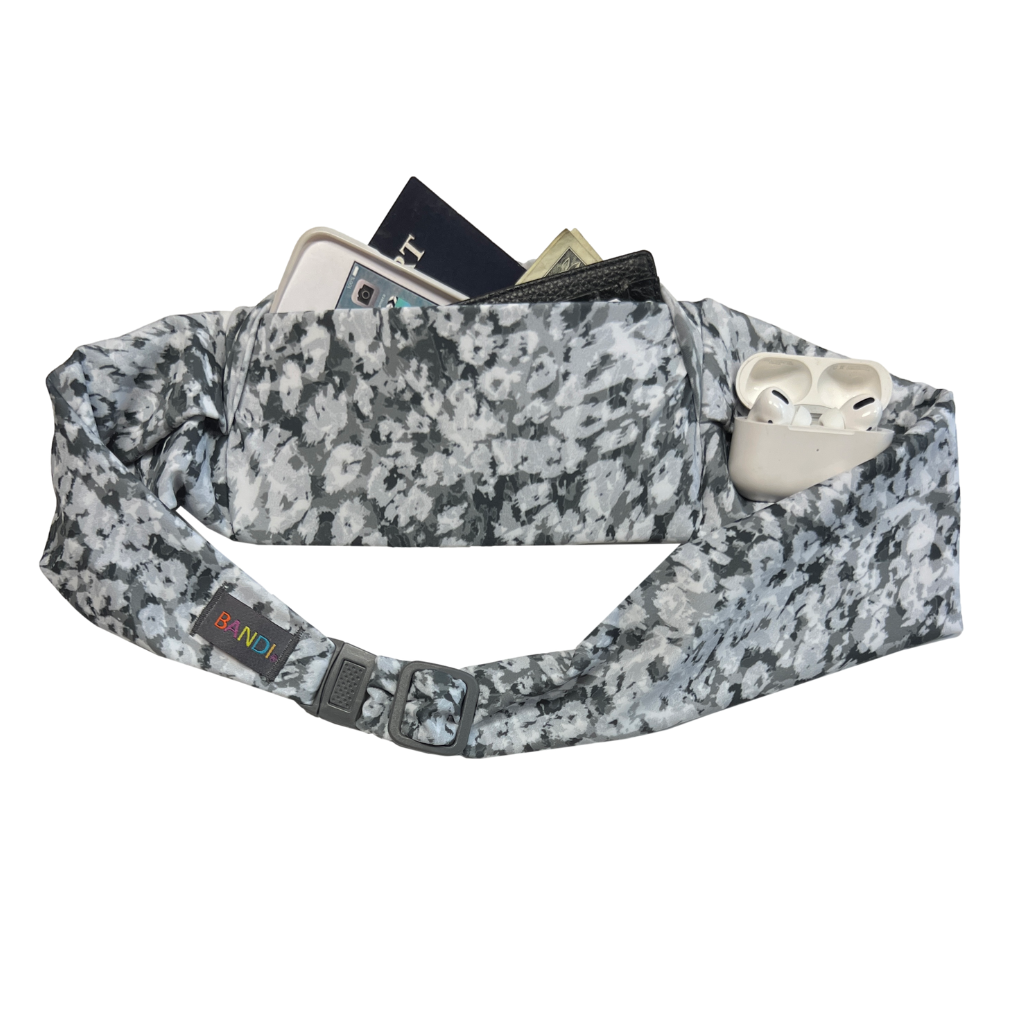 BANDI Pocketed Belt in Meadowland print of grey and white shades and items in pocket.