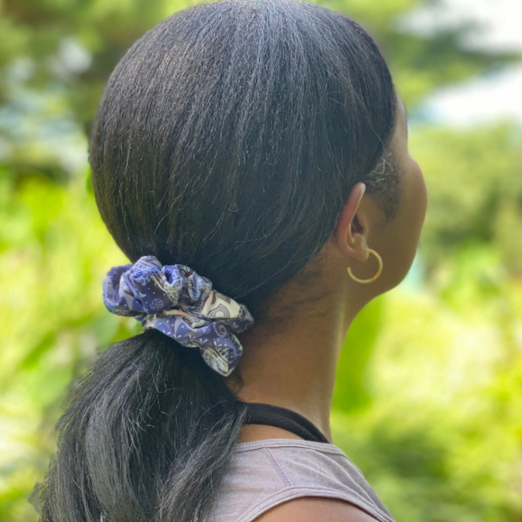 Model wearing BANDI blue bandana scrunchie in a ponytail