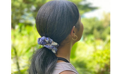 Model wearing BANDI blue bandana scrunchie in a ponytail