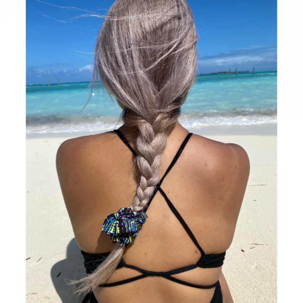 woman at beach wearing BANDI Confetti Scrunchie